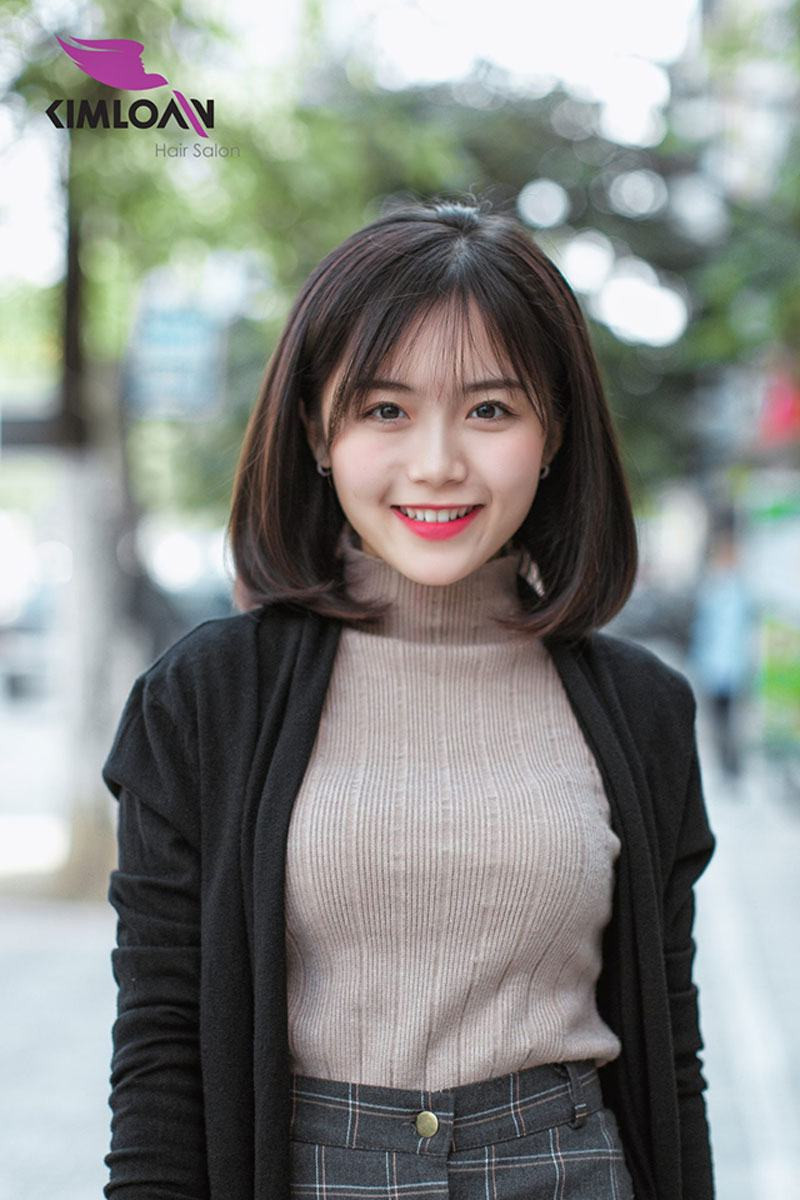 tóc ngắn uốn cụp